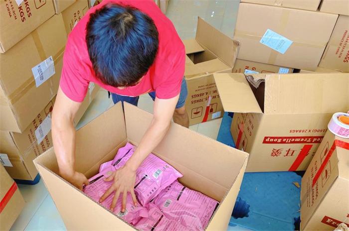 Multiple supplier packages waiting for consolidation at a China warehouse