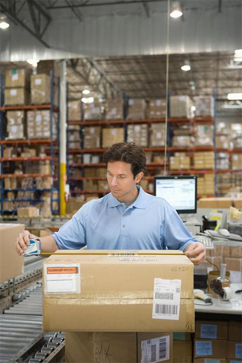 Warehouse staff checking product quantity, model numbers and package labels