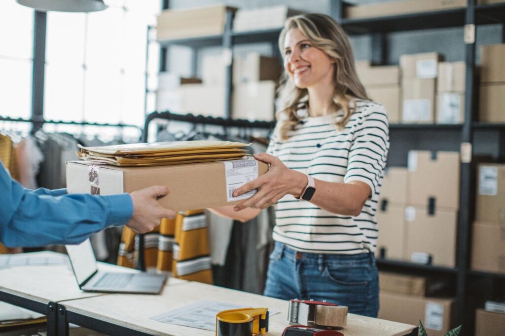 Small business owner receiving imported products shipped from China through international logistics